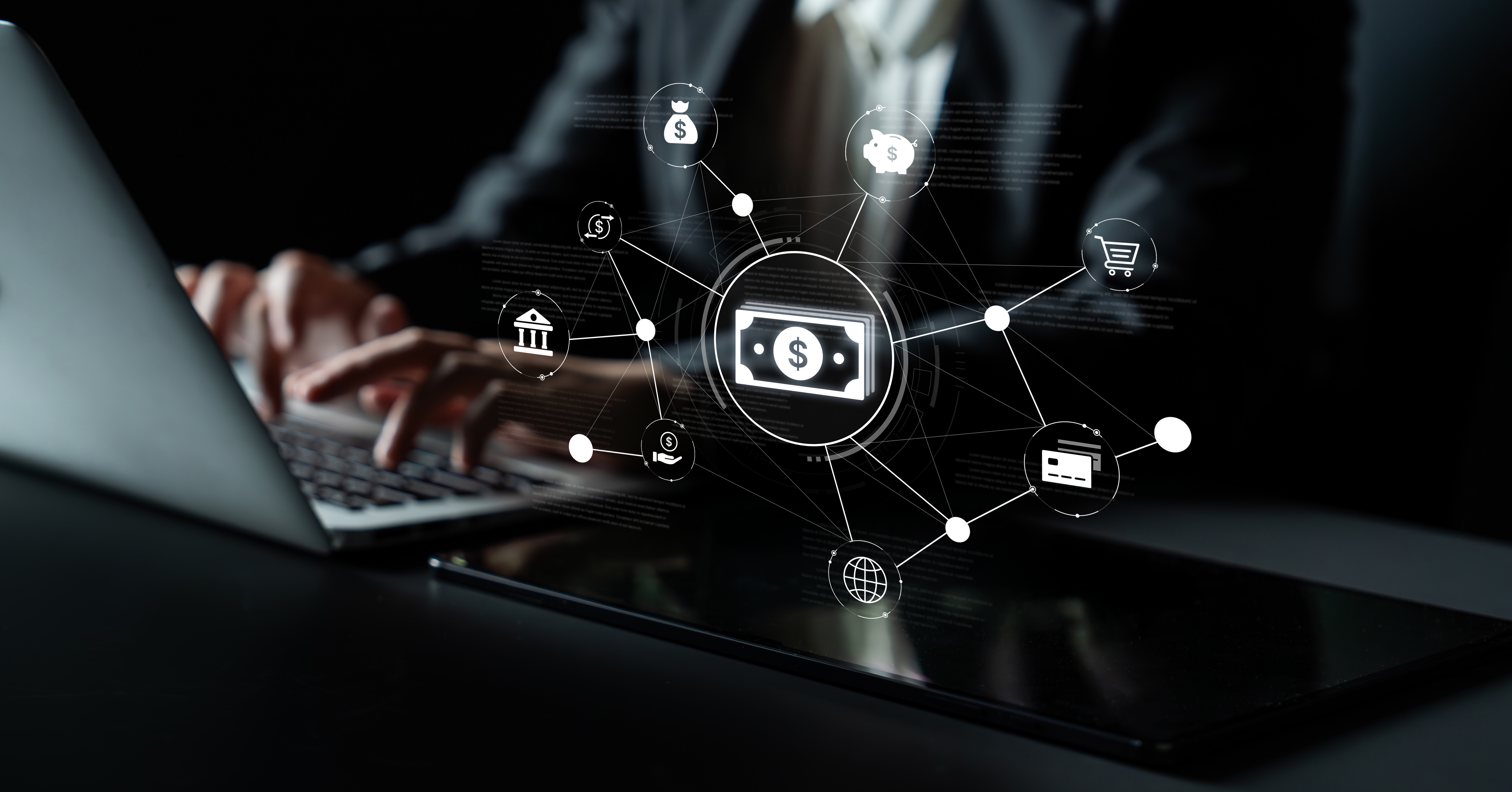 A professional man interacts with a laptop showcasing digital financial icons, symbolizing online payment systems and modern banking with innovative technology.